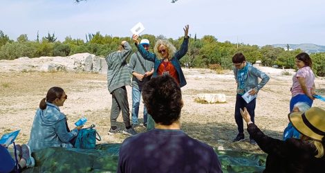 Families and friends reenact democratic assembly on Pnyx Hill festival.